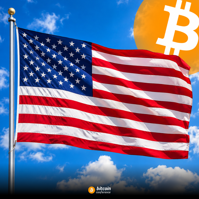 An American flag waves proudly against a blue sky alongside the Bitcoin logo, with "bitcoin conference" watermarked at the bottom—symbolizing the intersection of U.S. Labor Day and the pioneering spirit of the Bitcoin community, honoring the builders and workers shaping the future of decentralized finance.
