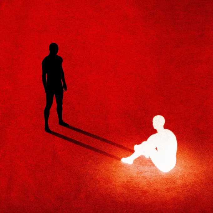 A dark silhouetted figure stands tall against a vivid red background, casting a long shadow that connects to a glowing white figure seated on the ground, visually embodying the concept of "Polarity" through contrasting opposites of darkness and light, standing and sitting, presence and absence.