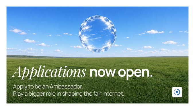 A promotional graphic shows a transparent glass globe floating above a green grassy field under a blue sky, with text reading "Applications now open. Apply to be an Ambassador. Play a bigger role in shaping the fair internet." alongside the Decentralised Citizens (D/acc) logo, recruiting ambassadors to expand the community-driven movement beyond its founding builders.