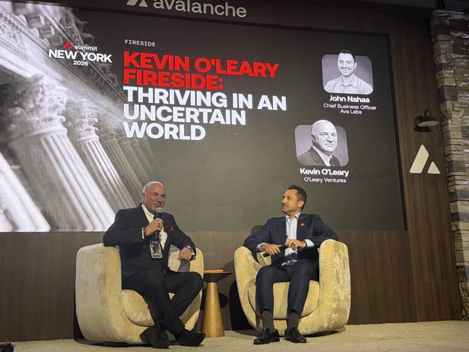 Kevin O'Leary sits alongside an interviewer at the Avalanche "Fireside: Thriving in an Uncertain World" event at Submmit NY 2024, sharing his views on the Clarity Act's chances of passing and its impact on crypto taxation and adoption.