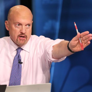 Jim Cramer is shown on his CNBC show, gesturing emphatically with a pen in hand, in a moment reflecting his on-air commentary about selling Bitcoin due to quantum computing concerns despite Bitcoin's price holding around $63,500.