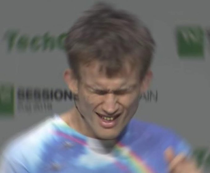A low-resolution, pixelated image of tennis player Novak Djokovic grimacing or reacting emotionally on court, with 'Techno' and 'BERBION' logos visible in the background.