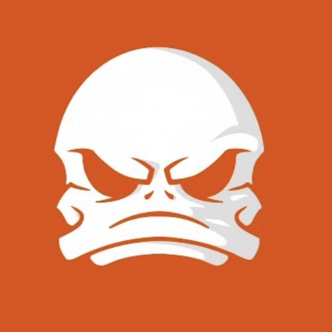 A stylized white skull with an angry, frowning expression is displayed on a bold orange background, serving as the avatar/logo for @UGLYDUCKLABZ NFT project mentioned in the post. The menacing skull design visually embodies the edgy, rebellious branding of the Ugly Duck Society collection minting at uglyducksociety.tech.
