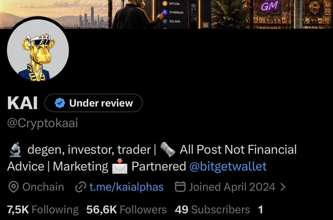 A Twitter/X profile for "KAI" (@Cryptokaai) shows a "Under review" status badge, a gold ape avatar, and a bio describing the account as a "degen, investor, trader" partnered with @bitgetwallet, with 56.6K followers. The post's mention of "Under review!" directly references the blue verification badge displayed on the profile, indicating the account's currently pending verification status.