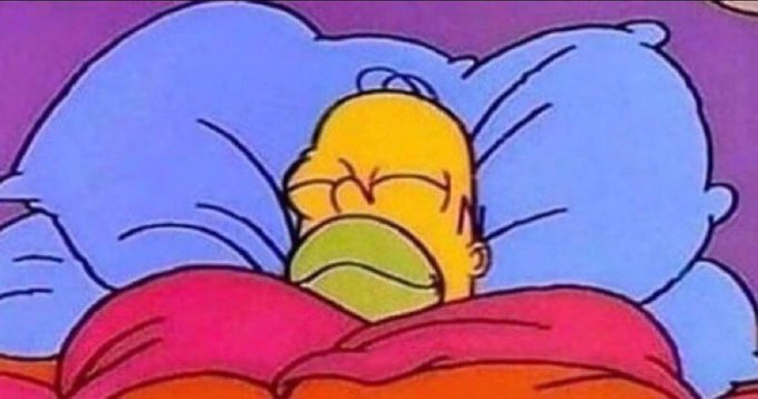A cartoon scene of Homer Simpson sleeping peacefully in bed with blue pillows and a red blanket against a purple background.