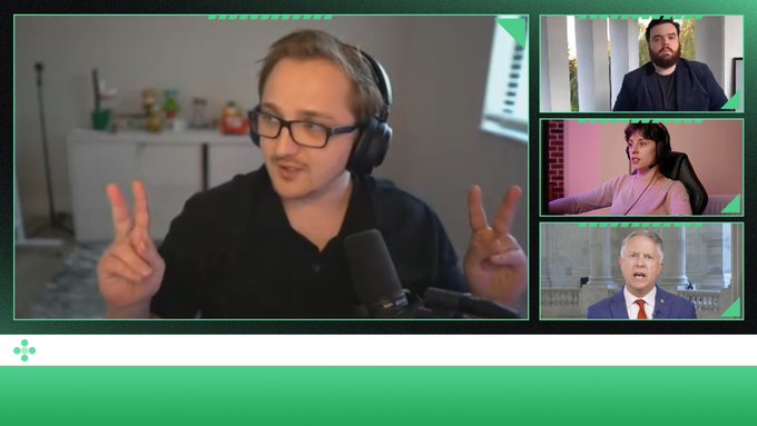 A video call interface shows a main speaker with glasses and headphones making peace signs, alongside smaller video feeds of Elon Musk, a young man in a pink shirt, and John Ewing.