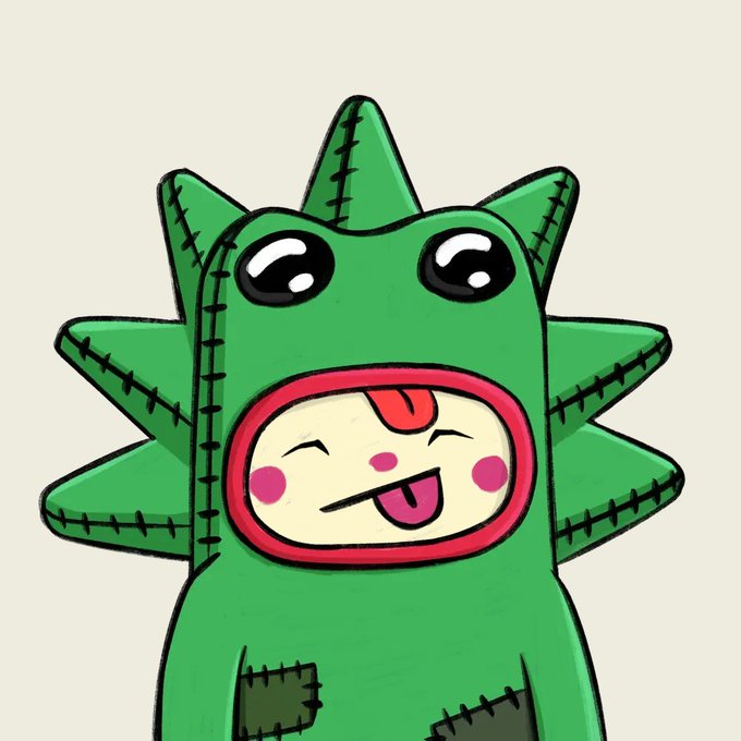 A cute cartoon character wearing a green dinosaur or dragon onesie with spikes, winking and sticking out its tongue playfully.