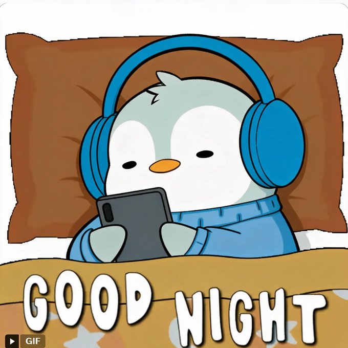 A cartoon GIF of a cute penguin wearing blue headphones and a blue sweater lying in bed looking at a phone, with the text 'GOOD NIGHT' displayed prominently.