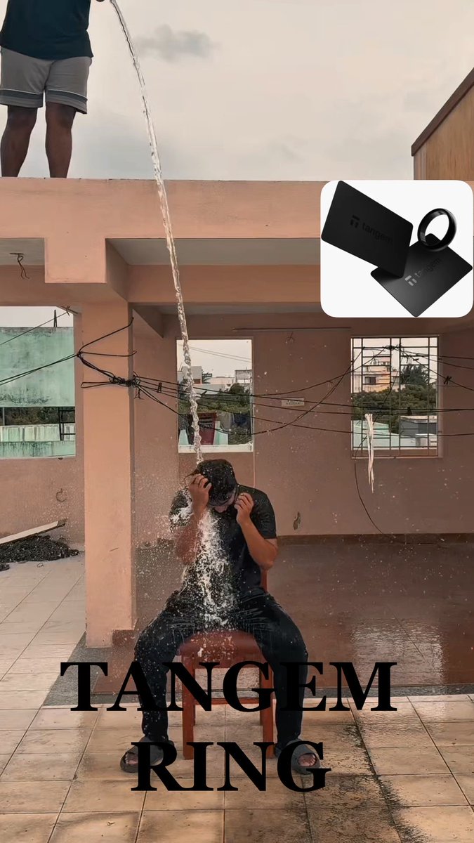 A promotional image for 'TANGEM RING' showing a person sitting in a chair on a rooftop while another person pours a bucket of water over them, with the product displayed in a black box.