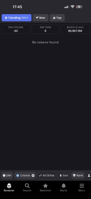 A mobile screenshot of a Cronos token screener showing "No tokens found" under the "Trending 24H" tab, with 0 24H volume, 0 transactions, and block ID 90,807,150. The empty screener reflects the post's message about a Cronos chain reroll causing services like Wolfswap and Ebisus to be temporarily offline.