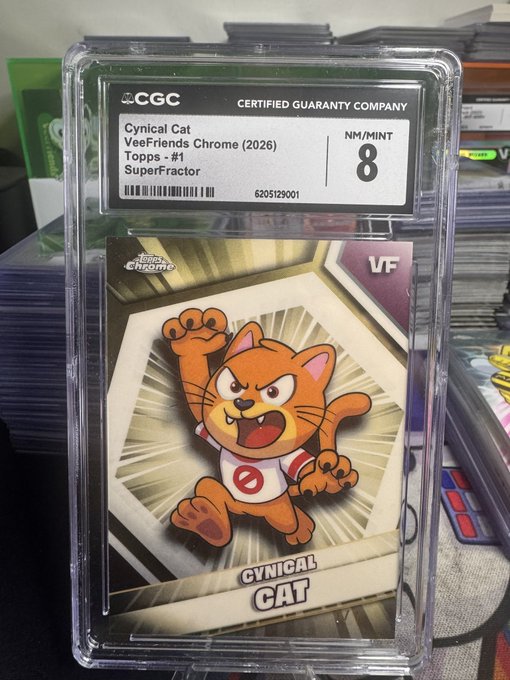 A CGC (Certified Guaranty Company) graded card slab containing a 'Cynical Cat' from VeeFriends Chrome (2026) Topps card, graded NM/MINT 8, displaying a SuperFractor variant with an orange cartoon cat character.
