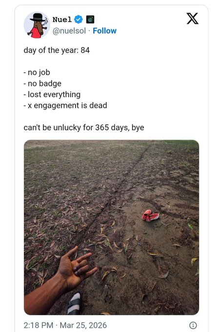 A tweet from user @nuelsol (Nue1) dated March 25, 2026 reads "day of the year: 84" and lists losses including "no job, no badge, lost everything, x engagement is dead," concluding "can't be unlucky for 365 days, bye." The accompanying image shows a hand extended over a dirt path with a discarded red sandal nearby, visually symbolizing the dramatic bad luck the tweet laments.