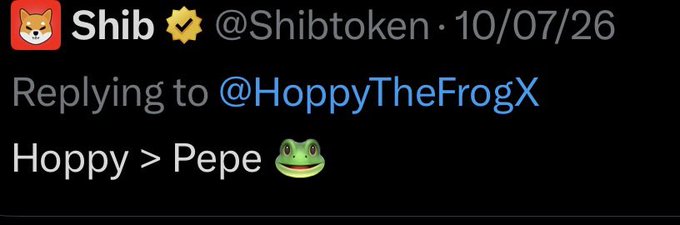 A verified X post from @Shibtoken replying to @HoppyTheFrogX states "Hoppy > Pepe" with a frog emoji, directly contradicting the user's message that denies creating rivalry between the $Hoppy and $Pepe meme coin narratives.