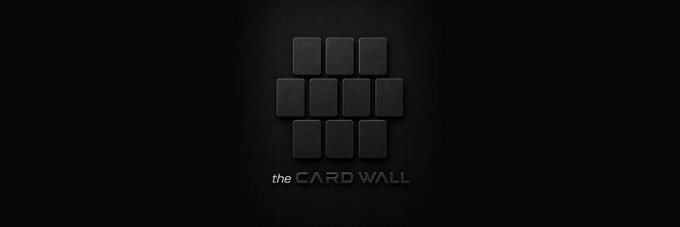 The image features a minimalist dark logo for "the CARD WALL," displaying an arrangement of 9 black card-like squares (3x3 grid) centered on a black background above the brand's text. The design visually represents the card-based collectible concept highlighted in the post, which announces the Card Wall's expansion to onchain with 4,444 NFTs launching through the Anvil AMM, bridging physical and digital collectible markets.
