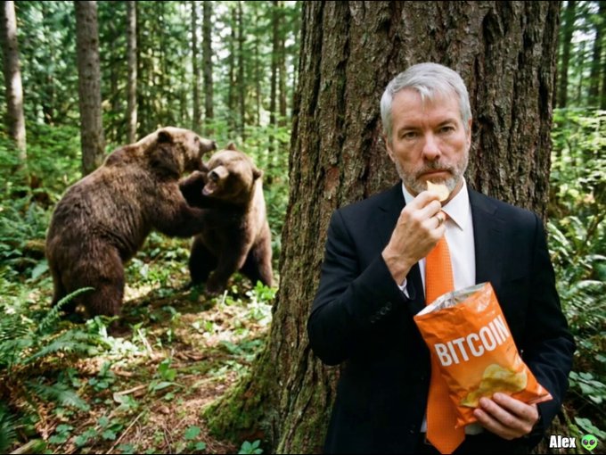 A man in a suit calmly eats from a bag labeled "BITCOIN" while two bears fight behind him, symbolizing Strategy (formerly MicroStrategy) holding cash instead of buying more BTC despite market volatility and bearish sentiment.