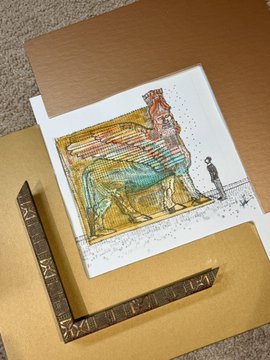 An artwork depicting an Egyptian pharaoh seated on a throne, framed by an ornate gold border.