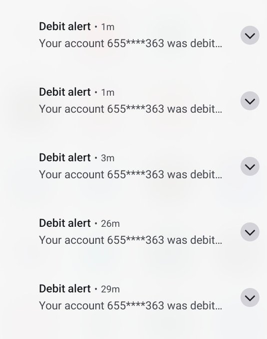 A smartphone notification screen displays multiple "Debit alert" messages for account 655\*\*\*\*363, with timestamps showing transactions occurring within the last 29 minutes, reflecting the series of automated salary payments referenced in the post about monthly service payments.
