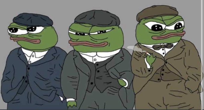 Three cartoon frog characters dressed in early 20th-century suits and flat caps stand together in a parody of a gangster movie scene.