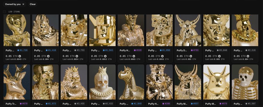 A grid of golden skull-like NFT figurines labeled 'Puffy' with various ETH prices displayed on a marketplace.