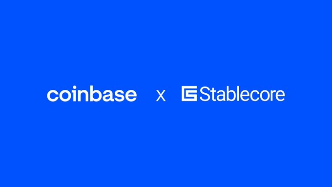 The image displays a blue background with the white "coinbase" logo paired with a stylized "x" and the "Stablecore" logo beside it, visually announcing their new partnership. The graphic corresponds to the post's announcement of Coinbase's collaboration with Stablecore to integrate digital asset custody, trading, and payment services with banks.