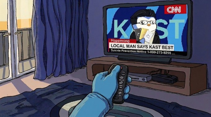 urn of water on a table, with a blue curtain and television displaying "Cnn" and "Kast rest", accompanied by a hand holding a remote control.