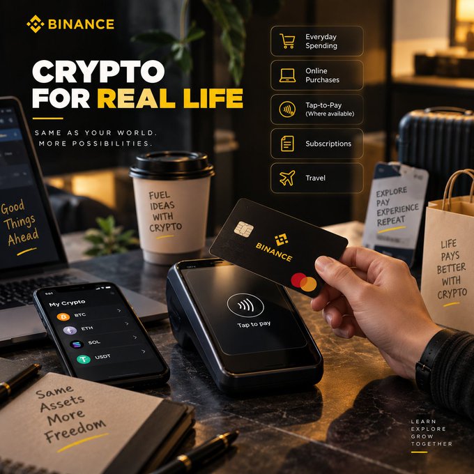 A Binance promotional image showcases a hand holding a black Binance Mastercard over a contactless payment terminal, with the tagline "CRYPTO FOR REAL LIFE — Same as your world. More possibilities," highlighting use cases including Everyday Spending, Online Purchases, Tap-to-Pay, Subscriptions, and Travel, while a nearby phone displays a "My Crypto" portfolio with BTC, ETH, SOL, and USDT, illustrating how users can directly spend their crypto holdings on real-world purchases.
