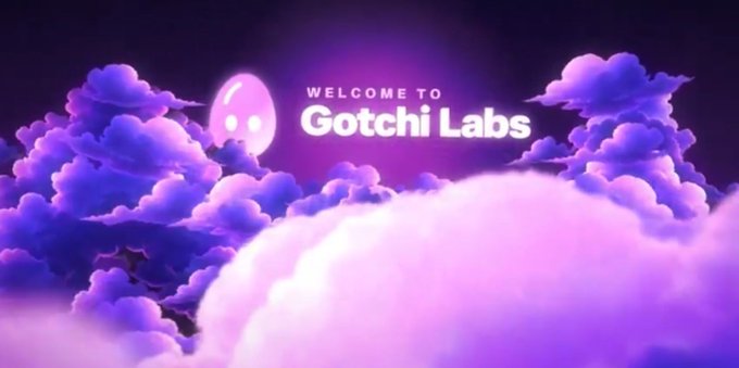 A digital banner reading 'WELCOME TO Gotchi Labs' features a glowing pink ghost-like character with eyes, set against a backdrop of purple and pink clouds in a night sky.