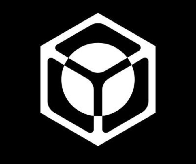 The image displays a minimalist black-and-white logo featuring a hexagon enclosing a circle, with three intersecting lines creating a "Y" or tri-spoke pattern at the center, representing the Nucleus (NCL) brand. The geometric, interconnected design visually reinforces the post's message about Nucleus serving as an "intelligence layer" that links reputation, capital, and opportunity through structured connections rather than randomness.