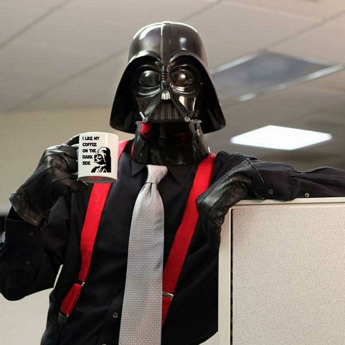 A person wearing a Darth Vader mask, black shirt, silver tie, and red suspenders holds up a coffee mug reading "I LIKE MY COFFEE ON THE DARK SIDE." The image humorously illustrates the post's demand to take control of one's own crypto, as Vader's imposing authority underscores the seriousness of moving litecoin to a self-custody wallet.