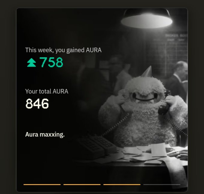 A dark graphic interface shows 'This week, you gained AURA' with an upward arrow next to '758' in green, and 'Your total AURA' is '846', featuring a black-and-white photo of a furry white monster at a desk with the caption 'Aura maxxing.'