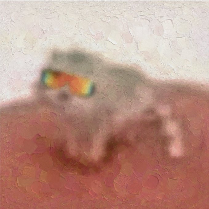 A heavily blurred, abstract impressionistic image in pink and white tones with a small rainbow-colored shape in the center.