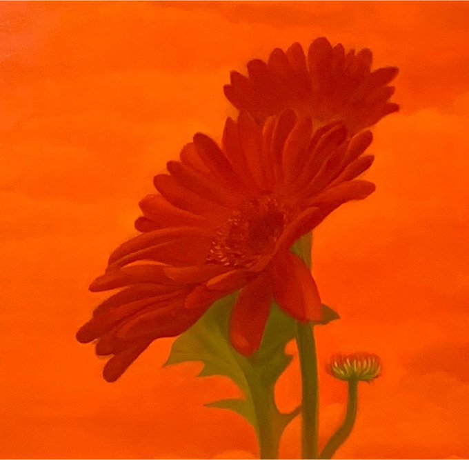A close-up painting of vibrant red gerbera daisies with green stems set against a warm orange background.