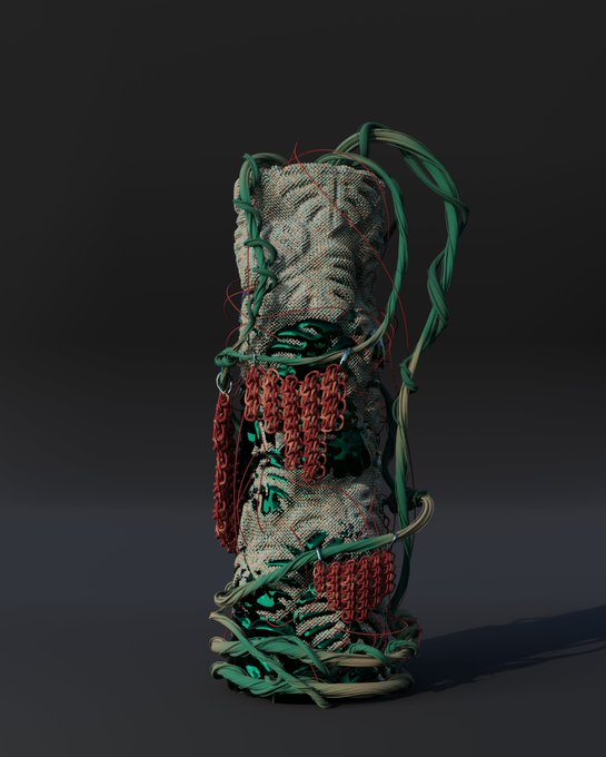 A sculptural object resembling a tall canister or vase wrapped in canvas and bound with green and beige cords, adorned with hanging red chain-like elements, displayed against a dark background.