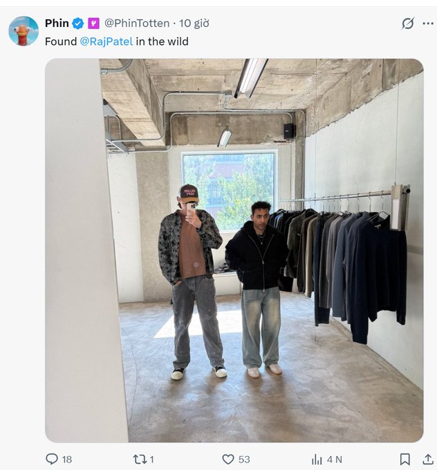 A screenshot of a tweet from Phin (@PhinTotten) captioned 'Found @RajPatel in the wild' showing a mirror selfie of two men in a clothing store.