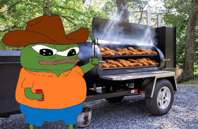 A Pepe the Frog meme wearing a brown cowboy hat and orange shirt standing next to a smoking barbecue smoker trailer filled with food.