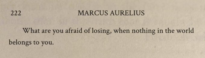A page from a book of Marcus Aurelius quotes reads, "What are you afraid of losing, when nothing in the world belongs to you." The post jokes that this ancient Stoic wisdom likely means Marcus Aurelius never had to worry about losing his NFTs, since they, like everything else, were never truly his to own.