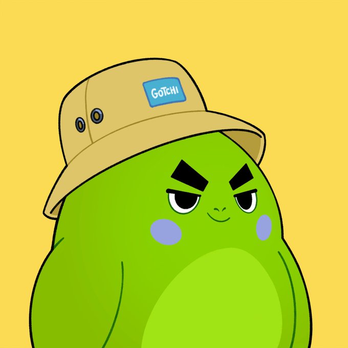A digital illustration shows a round green character with a grumpy expression, thick black eyebrows, and purple cheeks. The character wears a tan bucket hat featuring a blue patch that reads 'GOTCHI'.