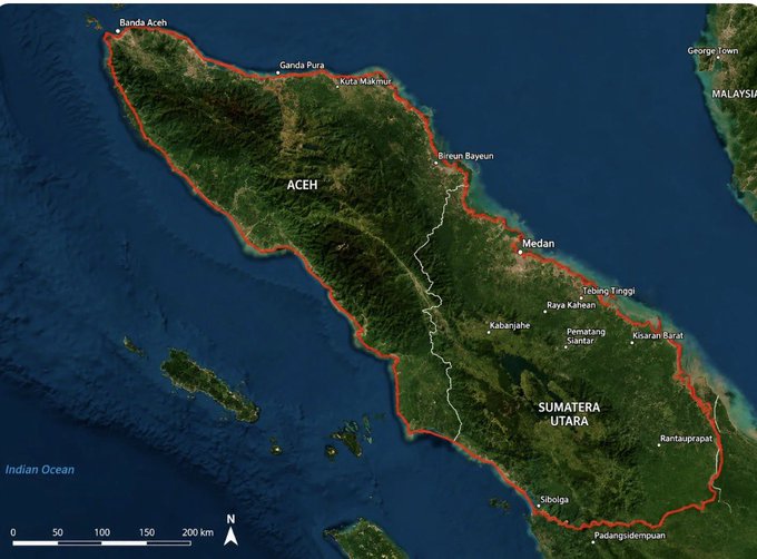 A satellite map shows the northern region of the island of Sumatra, with the borders of 'ACEH' and 'SUMATERA UTARA' outlined in red, featuring cities like Banda Aceh, Medan, and Sibolga.