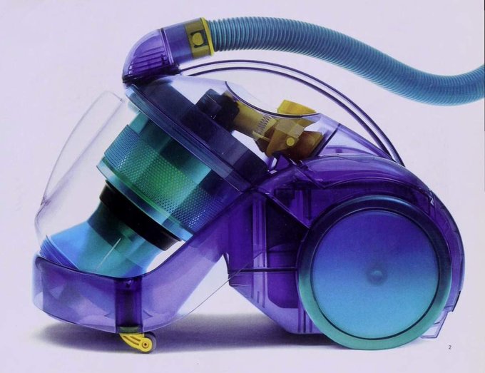 A purple and teal translucent canister vacuum cleaner (Dyson-style) is displayed on a white background.