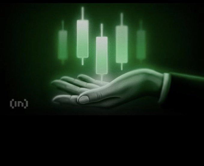 A green-tinted graphic image depicting an open hand holding glowing candlestick chart bars floating above it, with an '(in)' logo in the bottom left corner.