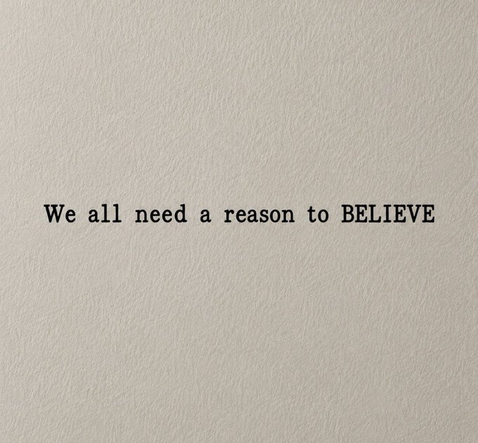 The image features a white background with black text that reads "We all need a reason to believe". The text is centered against a gray wall, creating a contrast between the two colors. The image also includes an additional line of text that says "Who else thought Anoma Intent Machine (IM) would become a major competitor to the Ethereum Virtual Machine (EVM)?". This statement seems unrelated to the main content and could be a distraction from the original message.