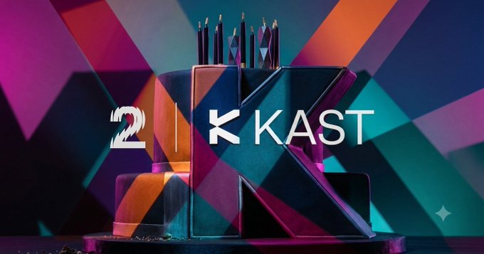 A stylized 3D promotional graphic features a dark, angular block with pencils on top, displaying the text '2K KAST' against a vibrant geometric background of teal, pink, and purple.