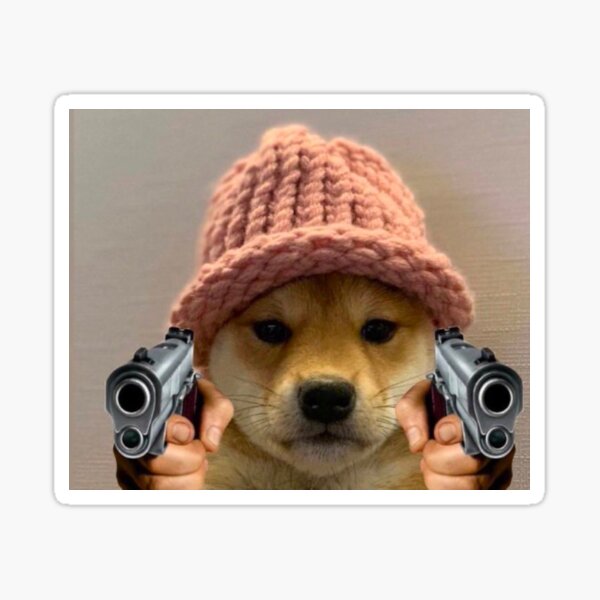 A meme-style image showing a golden puppy wearing a chunky pink knit beanie, with two hands pointing handguns at its face.