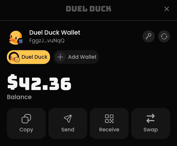 The image shows a Duel Duck Wallet interface displaying a balance of $42.36, with options to Copy, Send, Receive, and Swap, and the wallet address "FggzJ...vuNqQ." This visually supports the post's claim of receiving a first payout from Duel Duck, illustrating the actual earnings credited to the user's wallet.