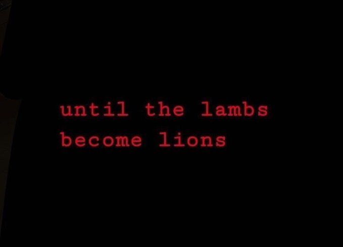 The image shows the red text "until the lambs become lions" displayed in a typewriter-style font against a black background, serving as a dramatic warning to novice NFT investors referenced in the post—suggesting newcomers ("lambs") must evolve into seasoned, savvy participants ("lions") to navigate the risky and volatile NFT market successfully.