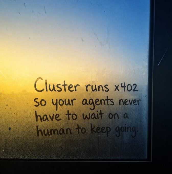Text written in condensation on a window reading "Cluster runs x402 so your agents never have to wait on a human to keep going." The message reinforces the post's theme of x402 as an open payment standard that enables autonomous agents to transact without human intervention.