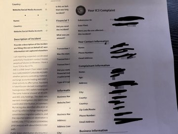 A digital IC3 complaint form with sections for website details, complainant information, and contact details, with personal information fields obscured by black redaction marks.