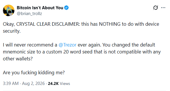 A tweet by @brian_trollz titled 'Bitcoin Isn't About You' criticizing Trezor for changing the default mnemonic seed size to a custom 20-word seed that is incompatible with other wallets, posted on Aug 2, 2026.