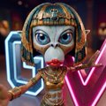 A 3D rendered character wearing an Egyptian pharaoh headdress against a neon-lit background.