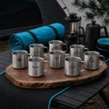 Several stainless steel and teal blue insulated tumblers are displayed on a wooden tray, likely serving as promotional prizes for a giveaway event related to rTokens, a peripheral vendor campaign mentioned in the tweet.